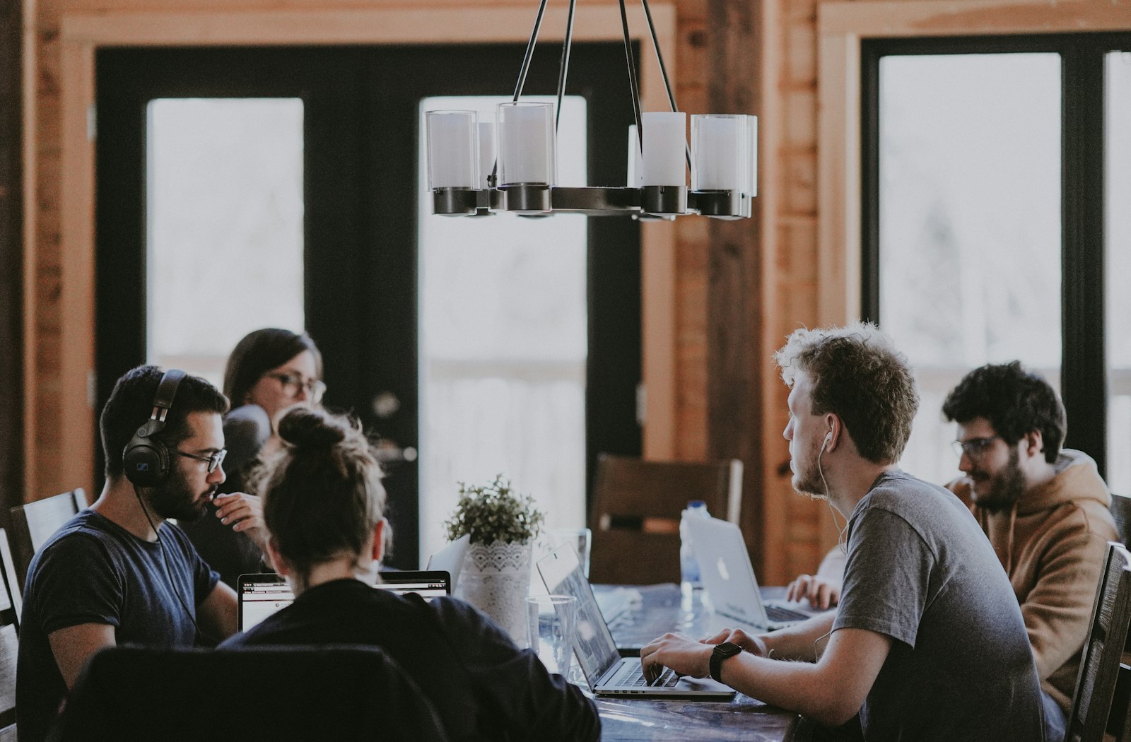 A collaborative team meeting in a premium workspace